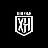 XH initial gaming logo with shield and star style design vector