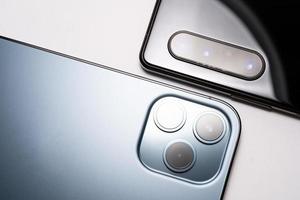 different number of cameras on smartphone. One, Two and Three Lenses Phone Camera photo