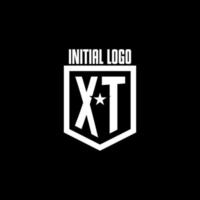 XT initial gaming logo with shield and star style design vector