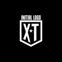 XT initial gaming logo with shield and star style design vector