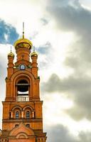 Christian church cross in high steeple tower for prayer photo