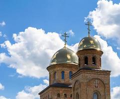 Christian church cross in high steeple tower for prayer photo