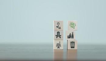 Companies are targeting net zero greenhouse gas emissions. Carbon credit concept.Tradable certificate to drive industry in direction of low emissions in efficiency cost. Wooden cubes with decrease CO2 photo