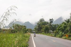 Morning mist on mountain and roads in rural Thailand photo