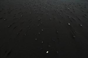 Close up basalt rocks on beach concept photo