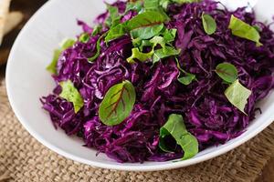 Salad of red cabbage with herbs photo
