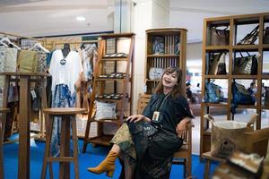 Yogyakarta, Indonesia - December 03, 2022  stylish female models among micro, small and medium enterprises, showing attractive clothes, accessories and properties. photo