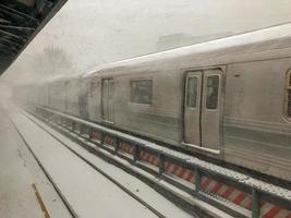 Brooklyn, New York - January 4, 2018 -  NYC Subway train stalled outdoors during a winter storm. photo