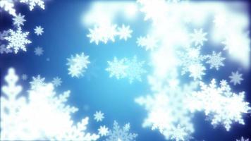 Beautiful festive blue Christmas New Year snowflakes shining falling glowing with blur effect and bokeh on blue background. Abstract background. Screensaver, video in high quality 4k