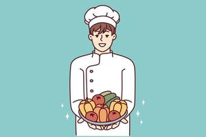 Satisfied man in chef clothes holds plate with fresh vegetables in hands offering to make vegetable salad. Restaurant cook demonstrating ingredients for preparing vegetarian food. Flat vector design