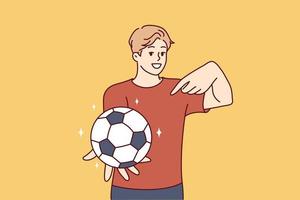 Young man holds out hand with soccer ball and points finger at it offering to play football. Guy teenager wants to lead active lifestyle compete in team sports. Flat vector illustration