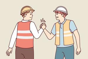 Two men in uniform of builders or repairmen shake hands holding each others palms tightly. Young guys in reflective vests and safety helmets demonstrate unity and solidarity. Flat vector design