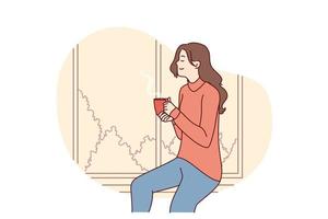 Attractive woman drinks tea sitting on windowsill and enjoys relaxing during break from work. Positive girl dreaming and watching landscape through window with cup coffee in hands. Flat vector image