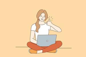 freelance, trabajo a distancia en línea, concepto de tecnologías de Internet. personaje de caricatura de una mujer feliz y sonriente sentada en el suelo con las piernas cruzadas trabajando en una computadora portátil y mostrando el pulgar hacia arriba vector