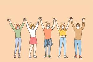 Friendship and having fun during COVID-19 pandemic concept. Group of young positive friends in protective medical face masks standing and holding raised hands in team during pandemic illustration vector