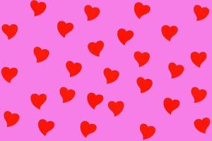 patrón de corazón rojo aislado sobre fondo rosa. símbolo de amante, día de san valentín y concepto de papel tapiz de amor de arte foto