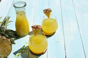Fresh pineapple cocktail with Fresh pineapple. summer drink concept. photo