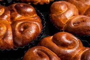 Fresh bread from the oven. Traditional cheese pie from Romania called Saralie. Homemade bread made from white wheat flour. photo