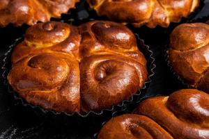 Fresh bread from the oven. Traditional cheese pie from Romania called Saralie. Homemade bread made from white wheat flour. photo