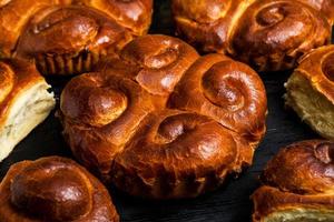 Fresh bread from the oven. Traditional cheese pie from Romania called Saralie. Homemade bread made from white wheat flour. photo