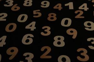 Background of numbers. from zero to nine. Numbers texture. Finance data concept. Mathematic. Seamless pattern with numbers. financial crisis concept. Business success. photo