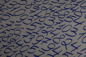 Background of numbers. from zero to nine. Numbers texture. Finance data concept. Mathematic. Seamless pattern with numbers. financial crisis concept. Business success. photo