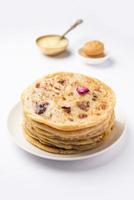 Sweet Khoya roti or Peda chapati paratha made using thickened cream milk or Khoa, khowa, mawa photo