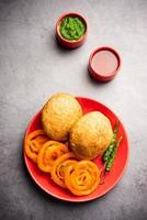 Kachori with Jalebi, snack combination from India also called kachauri, kachodi, katchuri, imarti photo