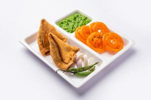 Veg Samosa with Jalebi, snack combination also called imarti and Sambusa, samusa photo