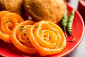 Kachori with Jalebi, snack combination from India also called kachauri, kachodi, katchuri, imarti photo