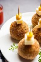 Corn Cheese balls with dip - popular party snack from India photo