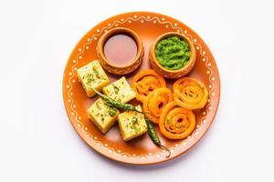 Khaman Dhokla with Jalebi or imarti, popular snack combination from India photo