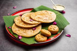 Sweet Khoya roti or Peda chapati paratha made using thickened cream milk or Khoa, khowa, mawa photo