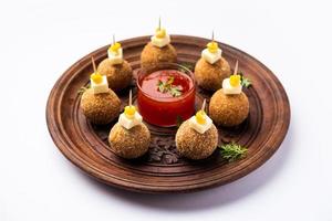 Corn Cheese balls with dip - popular party snack from India photo