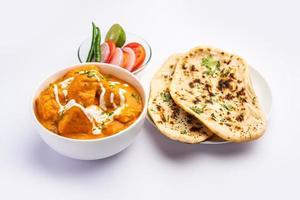 Tasty butter chicken curry or Murg Makhanwala or masala dish from Indian cuisine photo
