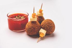 Corn Cheese balls with dip - popular party snack from India photo