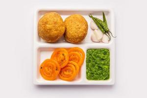 Kachori with Jalebi, snack combination from India also called kachauri, kachodi, katchuri, imarti photo
