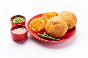 Kachori with Jalebi, snack combination from India also called kachauri, kachodi, katchuri, imarti photo