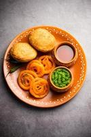 Kachori with Jalebi, snack combination from India also called kachauri, kachodi, katchuri, imarti photo