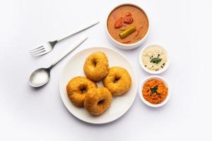 Sambar Vada or Medu vadai with sambhar and chutney - Popular South Indian snack or breakfast photo