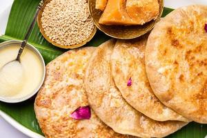 Til Gul roti for Makar Sankranti. Sweet Chapati, poli made using Sesame seeds, jaggery photo