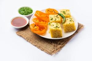 Khaman Dhokla with Jalebi or imarti, popular snack combination from India photo