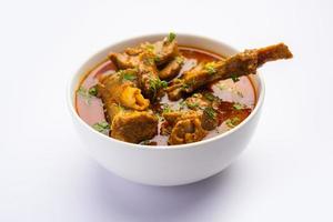 Indian style Mutton OR Gosht Masala OR indian lamb meat rogan josh served with Naan photo