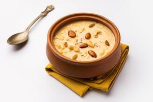 Nolen Gurer Chanar Payesh or Milk pudding of cottage cheese, rice and jaggery, bengali sweet recipe photo