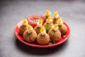 Corn Cheese balls with dip - popular party snack from India photo