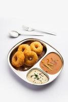 Sambar Vada or Medu vadai with sambhar and chutney - Popular South Indian snack or breakfast photo