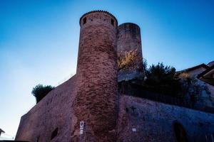the medieval castle of Castiglione falletto, in the heart of the Piedmontese Langhe near Alba in the autumn season photo