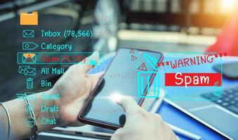 Concept of e-mail and computer viruses. Review the concepts of internet security, spam and e-marketing on screen. Spam email pop-up warnings. photo