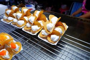 Thai Crispy Pancake Kanom Buang It is a street food in Thailand that is easy to find. photo