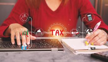 The Concept of taxes paid by individuals and corporations such as VAT, income tax and property tax Data analysis, paperwork,Financial research. Background for your business. photo